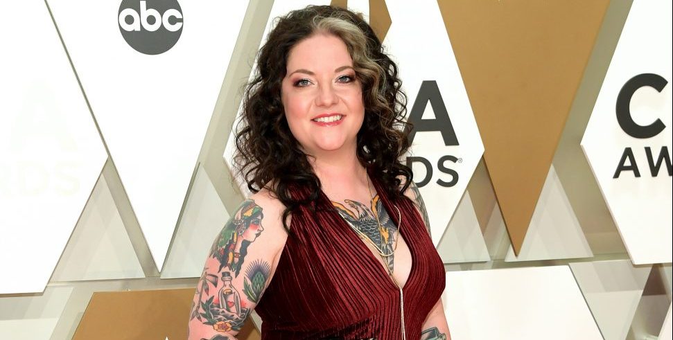 Ashley McBryde Backstage At CMAs: 'Girls This Thing Is Heavy'