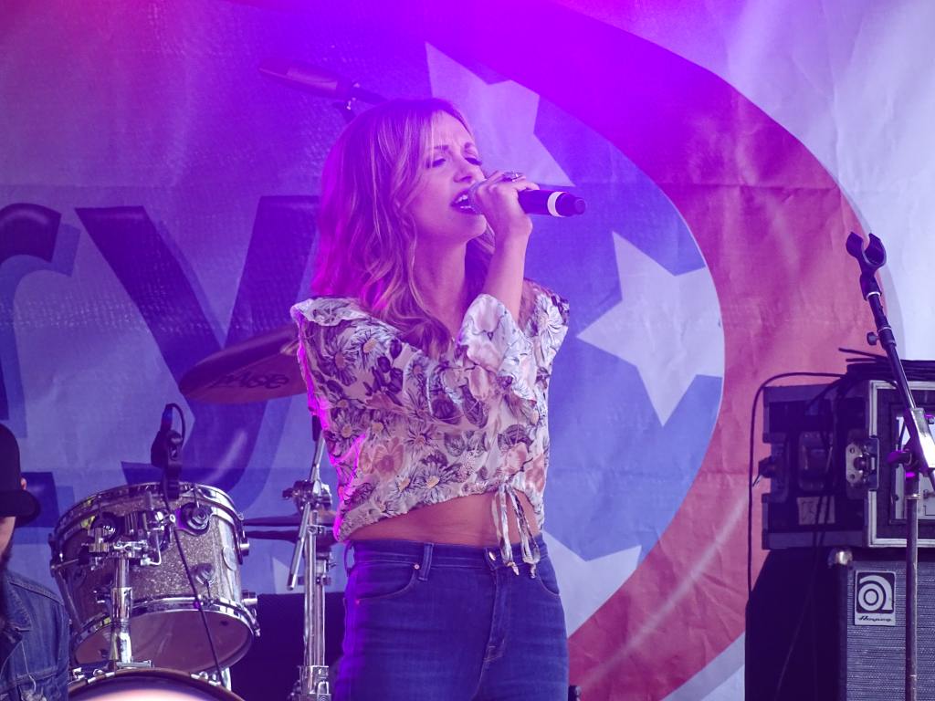 Carly Pearce on stage at Country 1025 Street Party