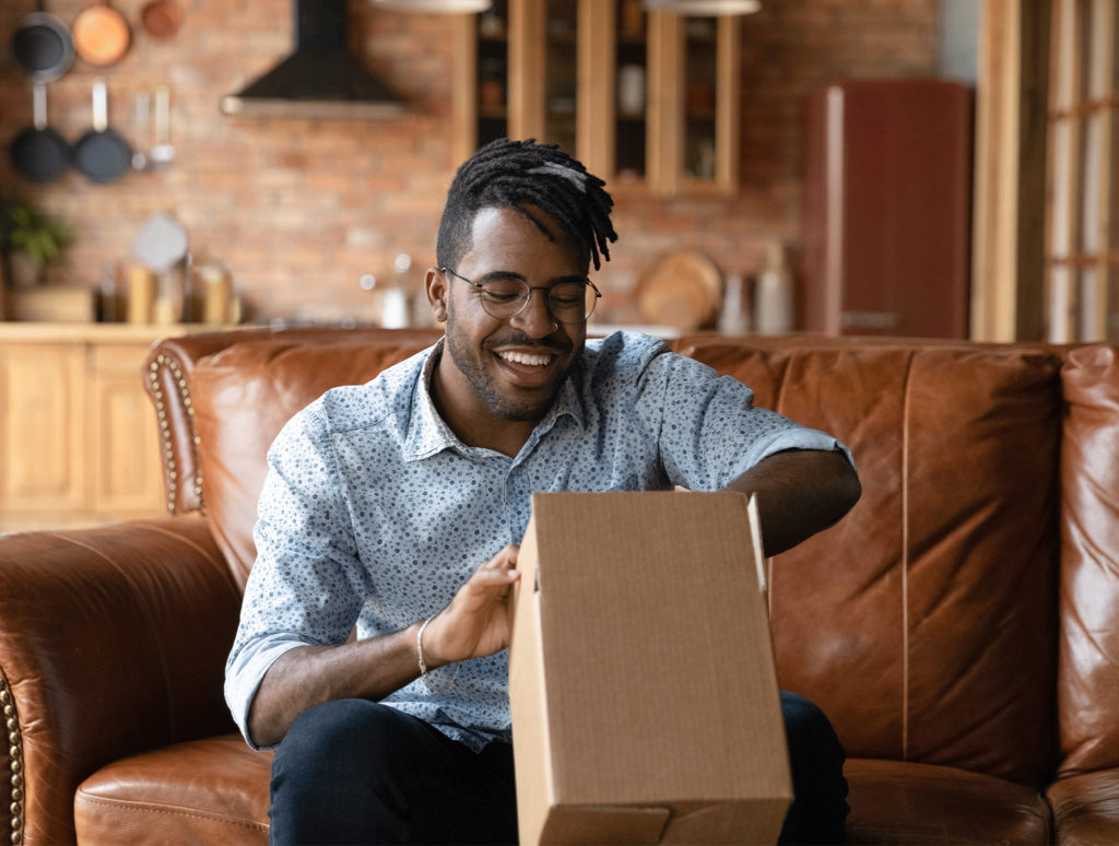 man opening a package