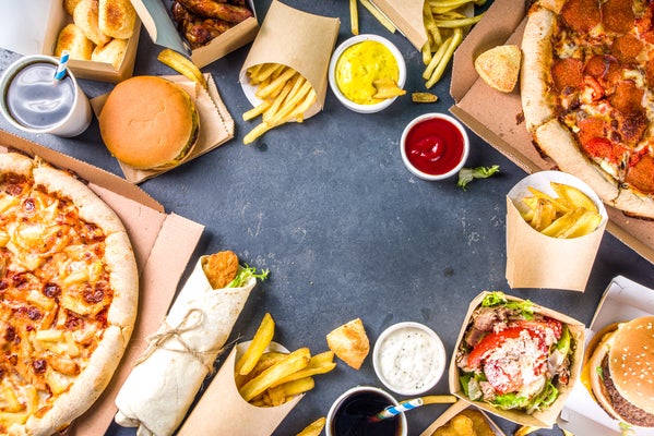 A table of Food for an outdoor event. HarpoonFest food vendors include offered at Tenoch Mexican and Harpoon's own pretzels