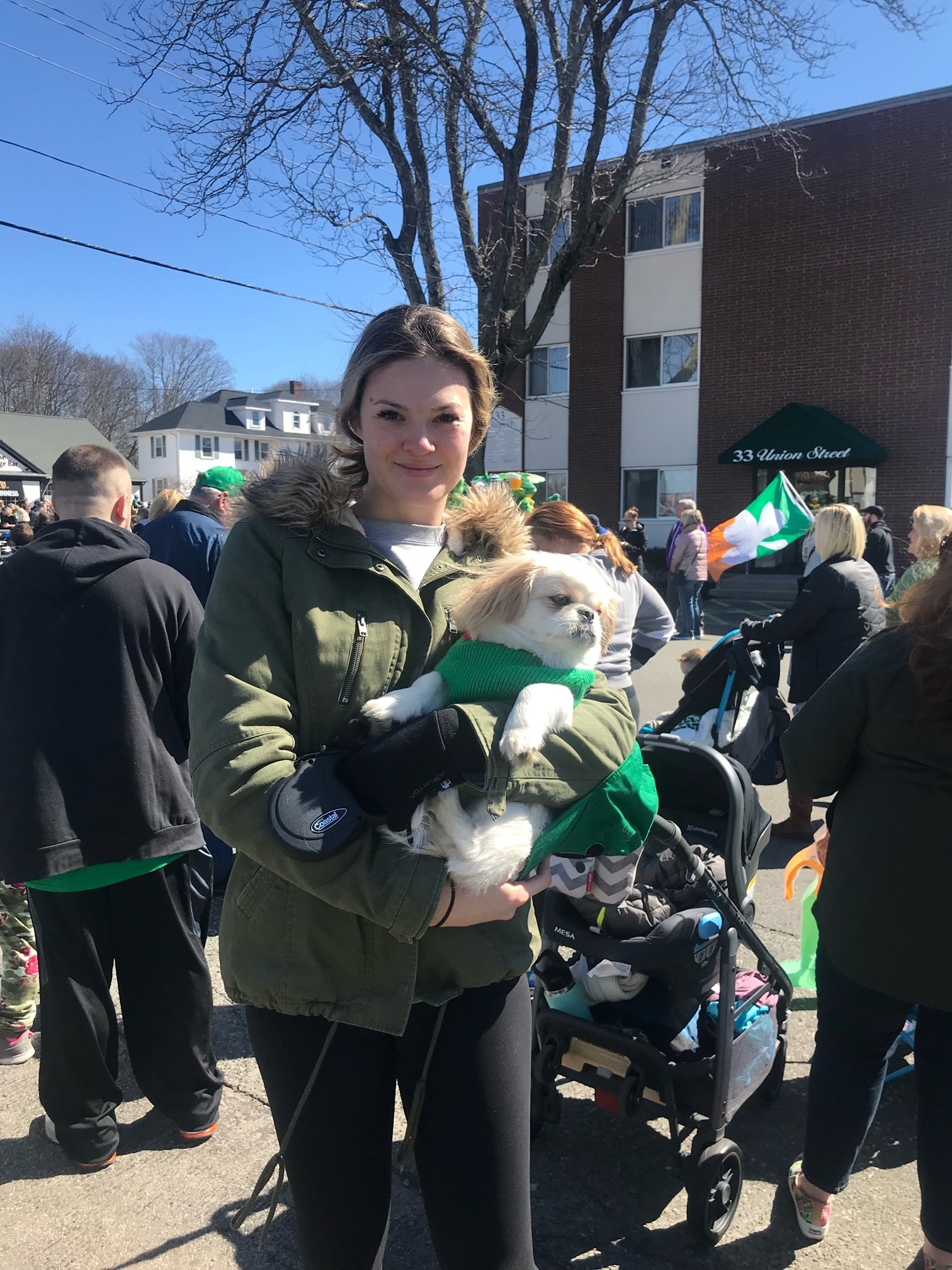 Ayla Brown and her dog Brate at the Weymouth Irish Parade
