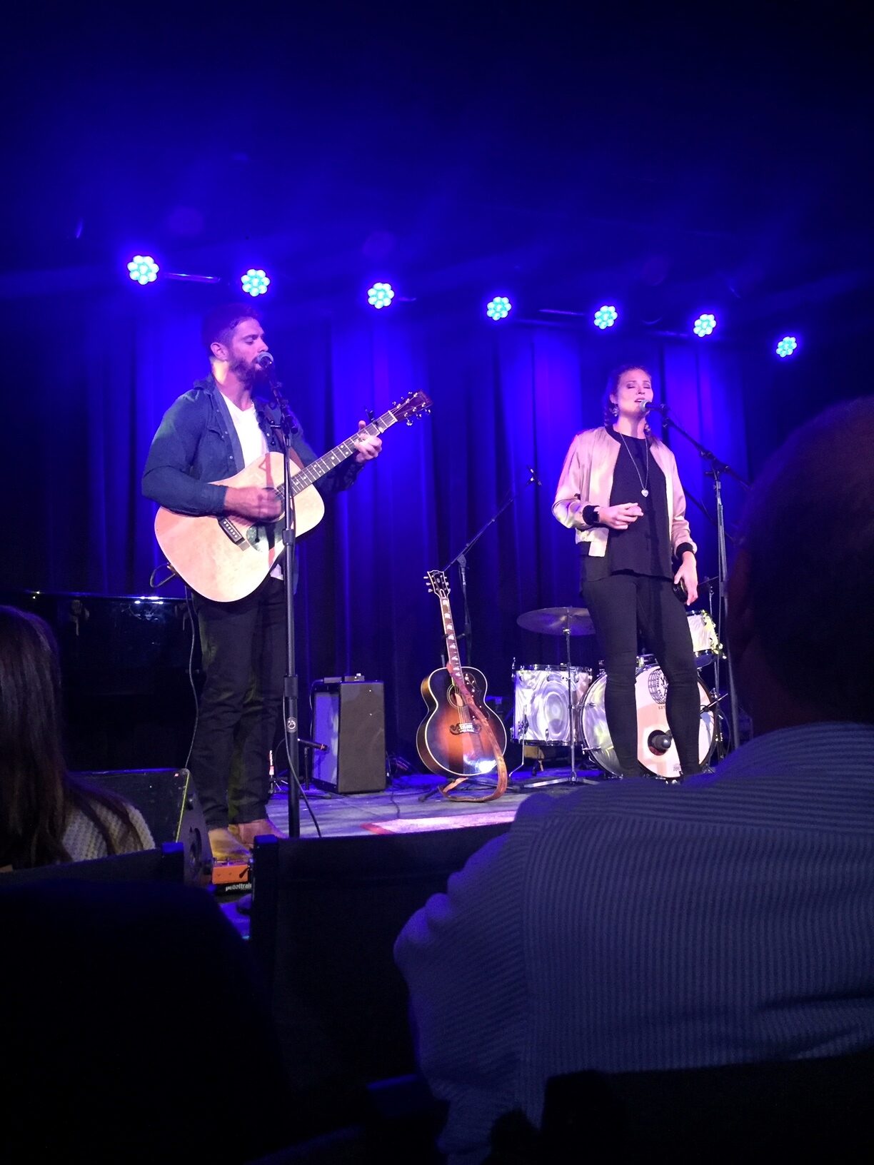 Ayla Brown and Rob Bellamy performing on stage