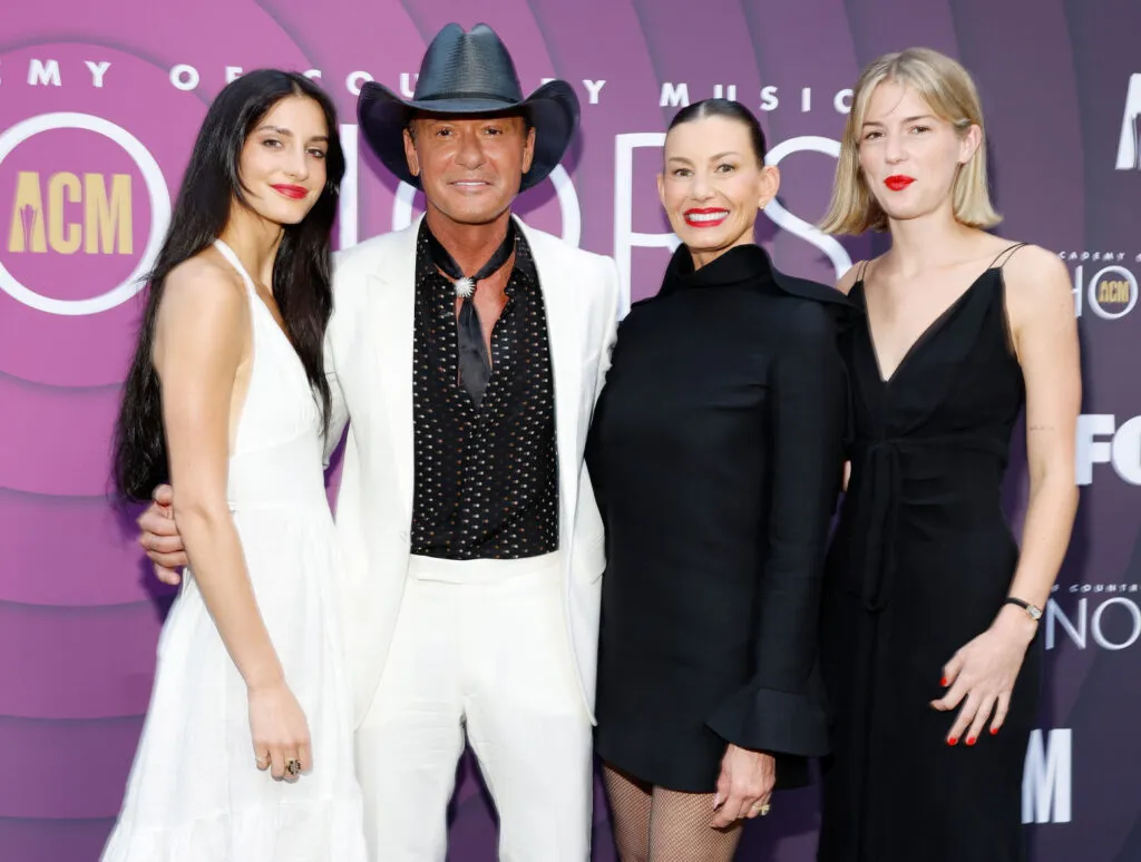 Tim McGraw's Daughter - Tim, and two of his daughters and his wife, Faith Hill all wearing black and white. 